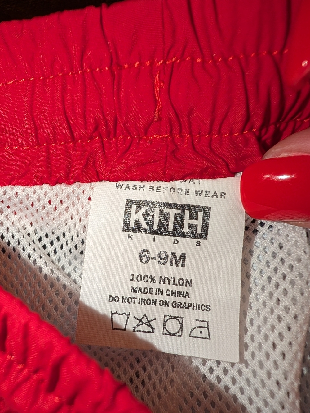 KITH Kids colorblock swim trunks in red, blue, & white w/ embroidered KITH logo - Picture 3 of 3